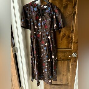 Gorgeous Embroidered Midi Dress with floral detail. Perfect for a wedding guest.